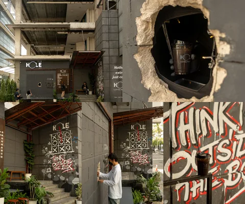 ภาพรีวิว Hole cafe • เมืองทองธานี — คาเฟ่บนถนนบอนด์สตรีทที่รับออร์เดอร์ผ่านช่องผนัง
