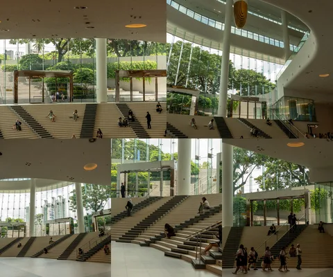 ภาพรีวิว ศูนย์การประชุมแห่งชาติสิริกิติ์ — สถาปัตยกรรมและบันไดโถงกระจกที่เปิดมุมมองสู่สวน