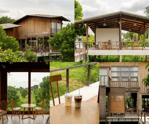 ภาพรีวิว ปองมาศ คาเฟ่ • เกาะเกร็ด — เรือนไม้ยกพื้นกับพื้นที่นั่งริมแม่น้ำ